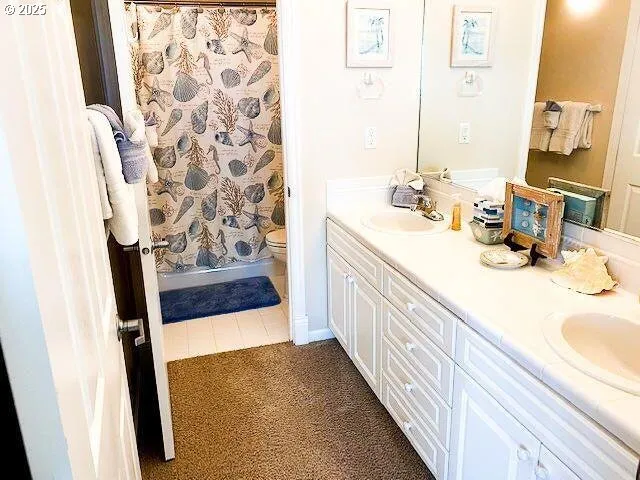 a bathroom with a sink a bathtub and shower