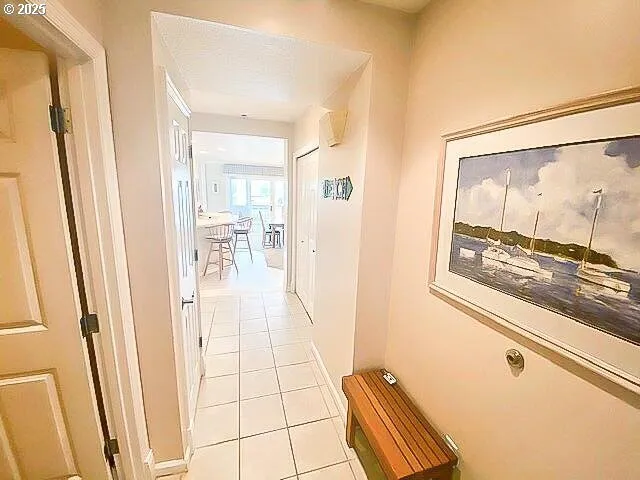 a view of a hallway and interior of the house