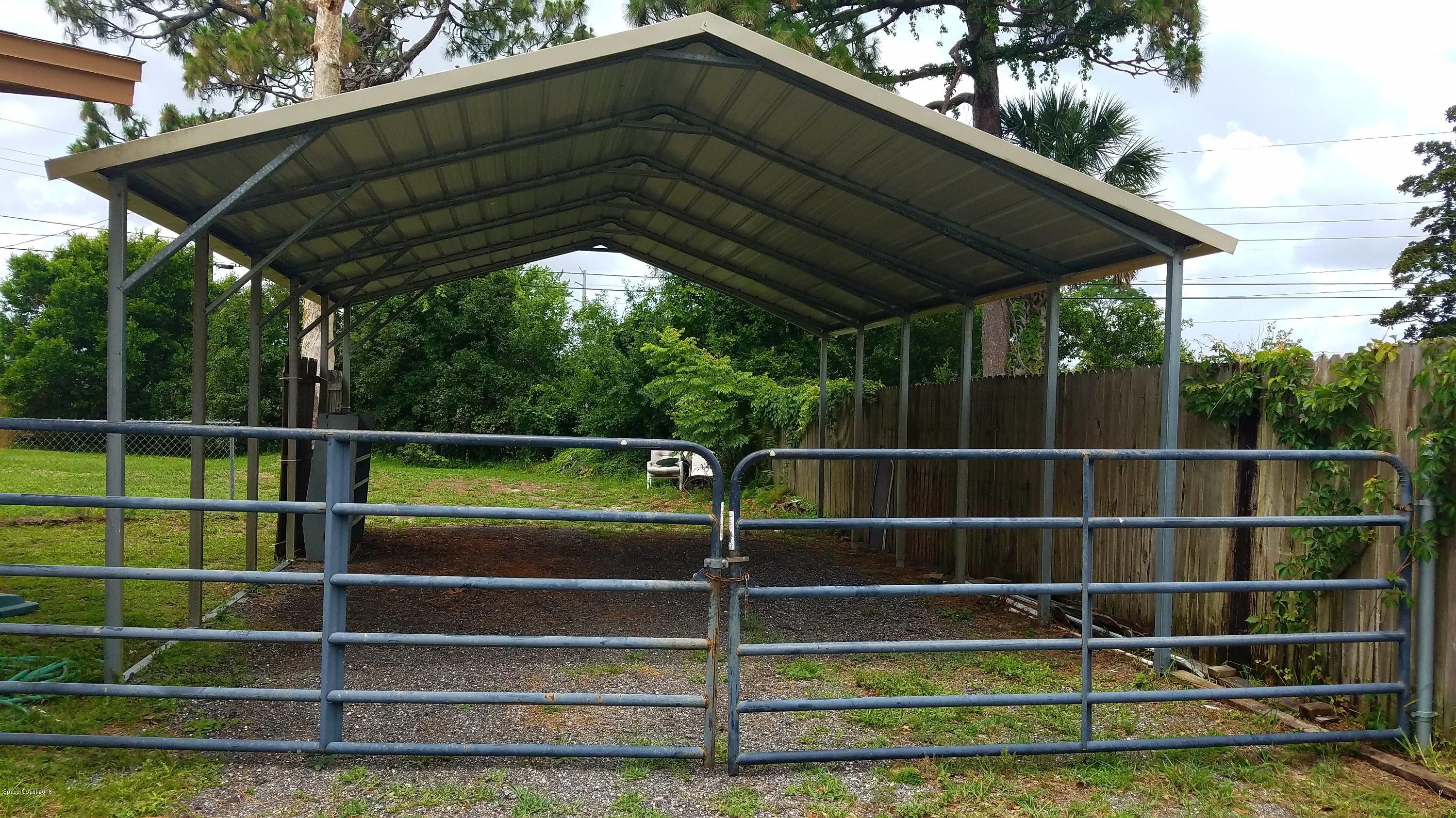 4370 Kent Avenue Titusville, FL 32780 - Photo 15 of 16 Kent carport