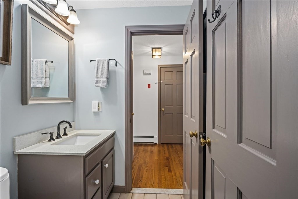 29 Gay Road Brookfield, MA 01506 - Photo 14 of 42 a bathroom with a sink a mirror and a shower
