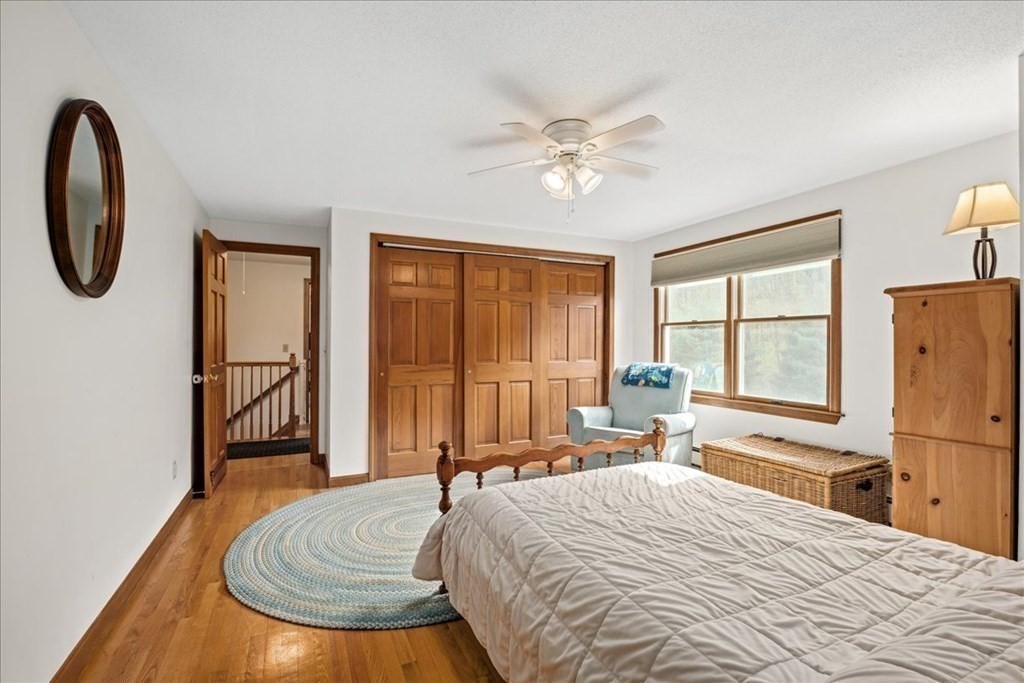 29 Gay Road Brookfield, MA 01506 - Photo 27 of 42 a bedroom with a bed and a large window