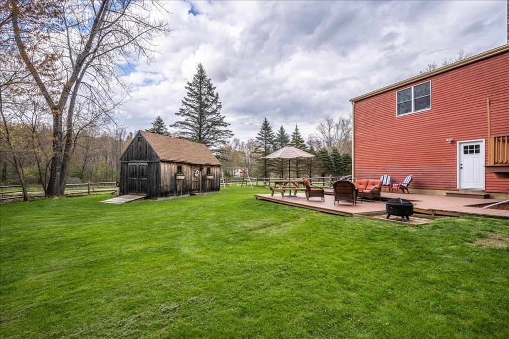 29 Gay Road Brookfield, MA 01506 - Photo 34 of 42 a view of a house with backyard sitting area and garden