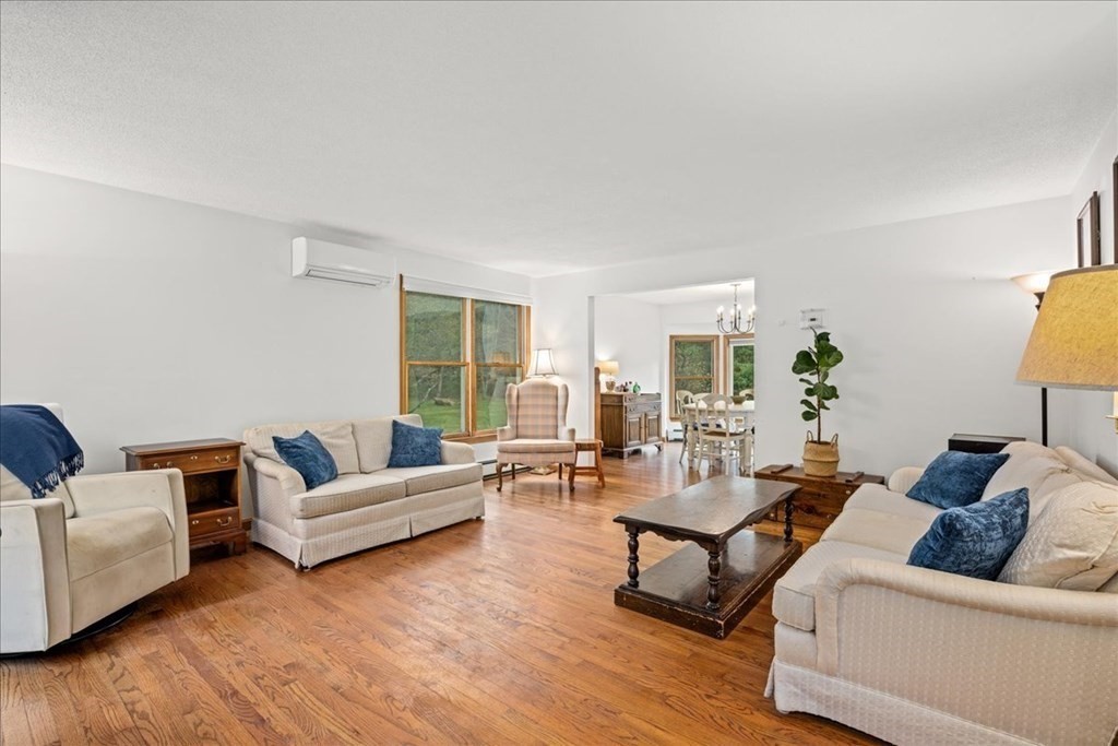 29 Gay Road Brookfield, MA 01506 - Photo 5 of 42 a living room with furniture and a wooden floor