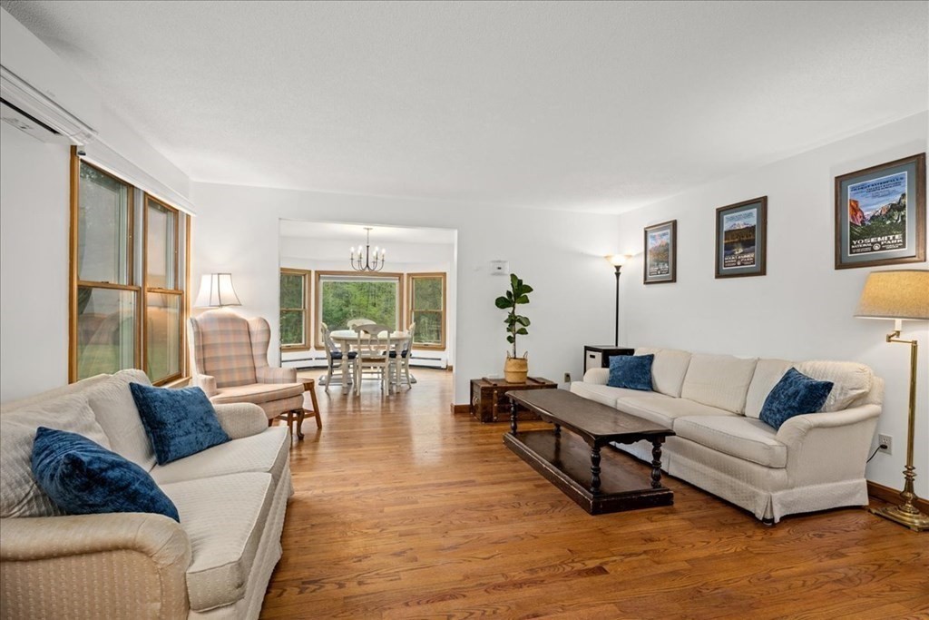 29 Gay Road Brookfield, MA 01506 - Photo 6 of 42 a living room with furniture and a large window