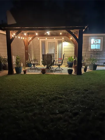 a house view with a garden space