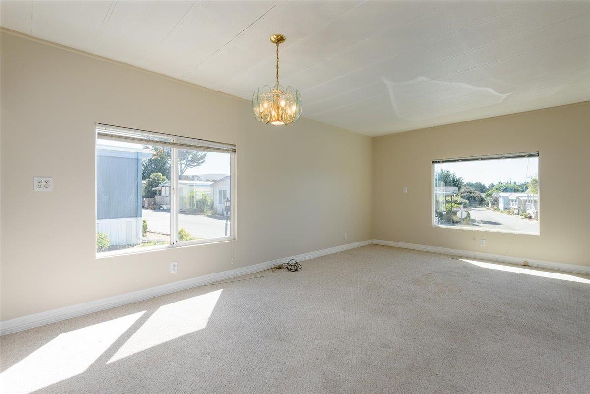 52 Oceanview Avenue, Unit 52 Half Moon Bay, CA 94019 - Photo 3 of 15 an empty room with a window