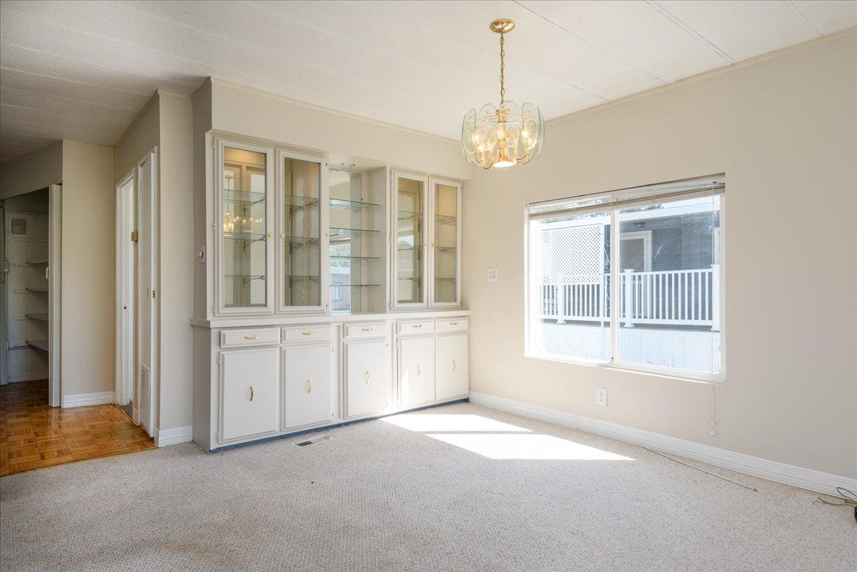 52 Oceanview Avenue, Unit 52 Half Moon Bay, CA 94019 - Photo 8 of 15 a view of an empty room with a window