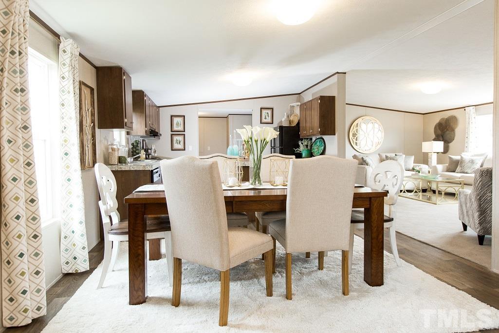 940 Barnes Road Middlesex, NC 27557 - Photo 5 of 11 a dining room with furniture and window