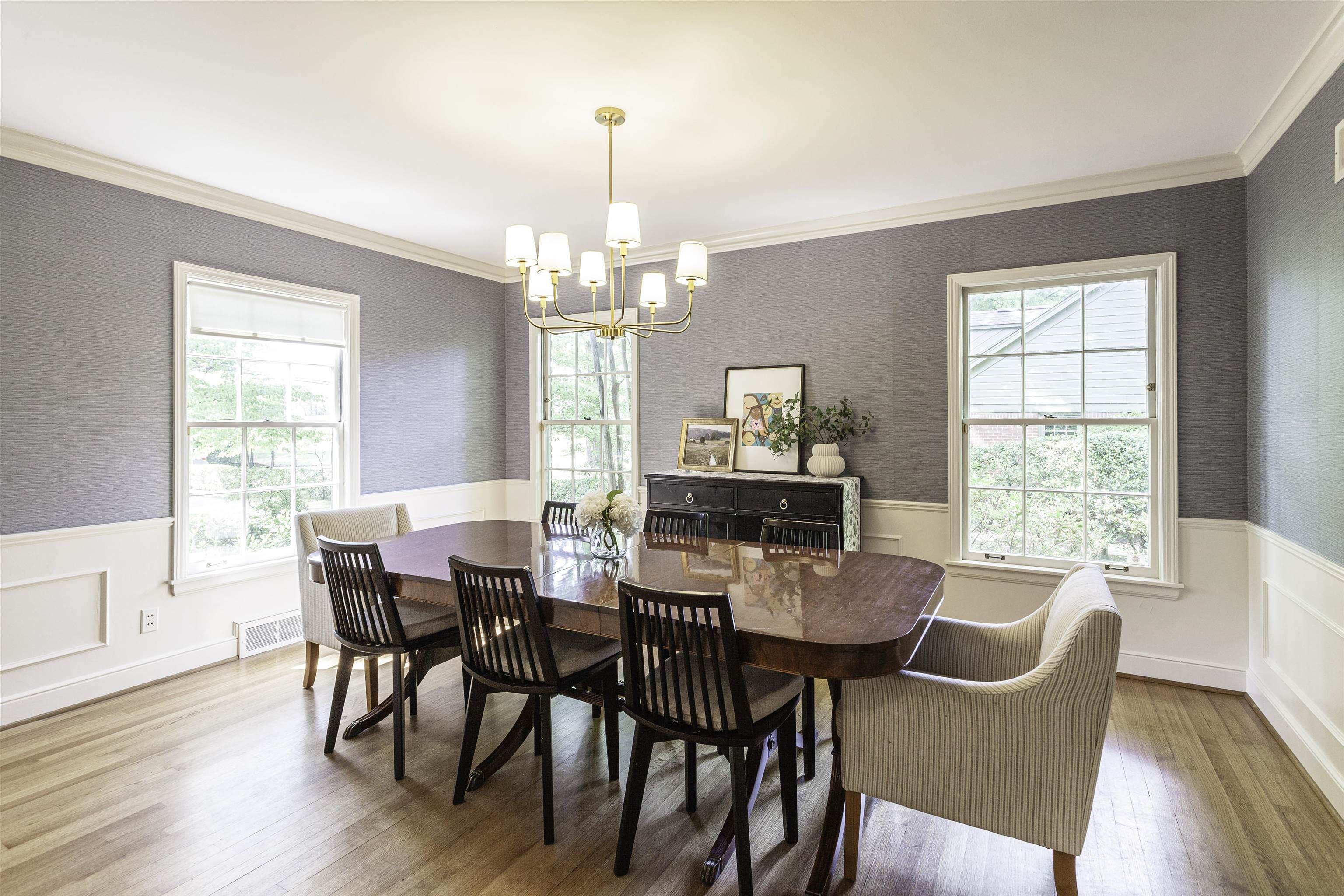 480 Colonial Road Memphis, TN 38117 - Photo 3 of 16 Formal room featuring wood-finish flooring, wainscoting, and crown molding