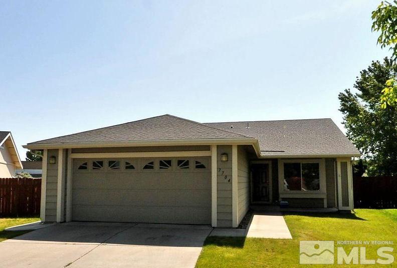 7704 Pickering Circle Reno, NV 89511 - Photo 1 of 1 a front view of a house with a yard