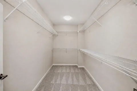 a bath room with a sink and a mirror