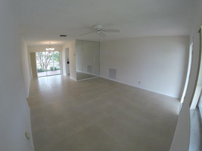 4610 Northwest 47th Street Tamarac, FL 33319 - Photo 2 of 10 a view of empty room with window