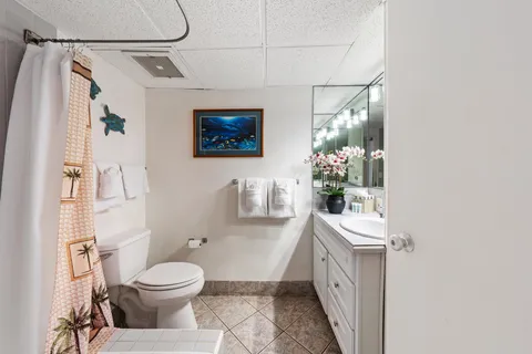 a bathroom with a sink a vanity and a mirror