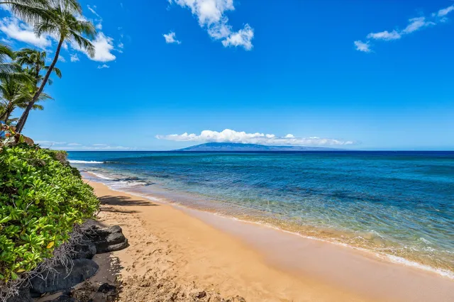 a view of a chairs and table in a room