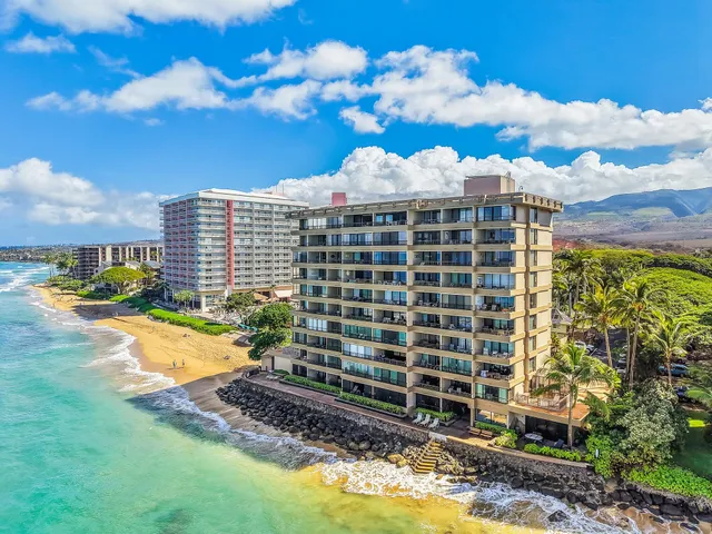 a living room with furniture floor to ceiling window and dining table