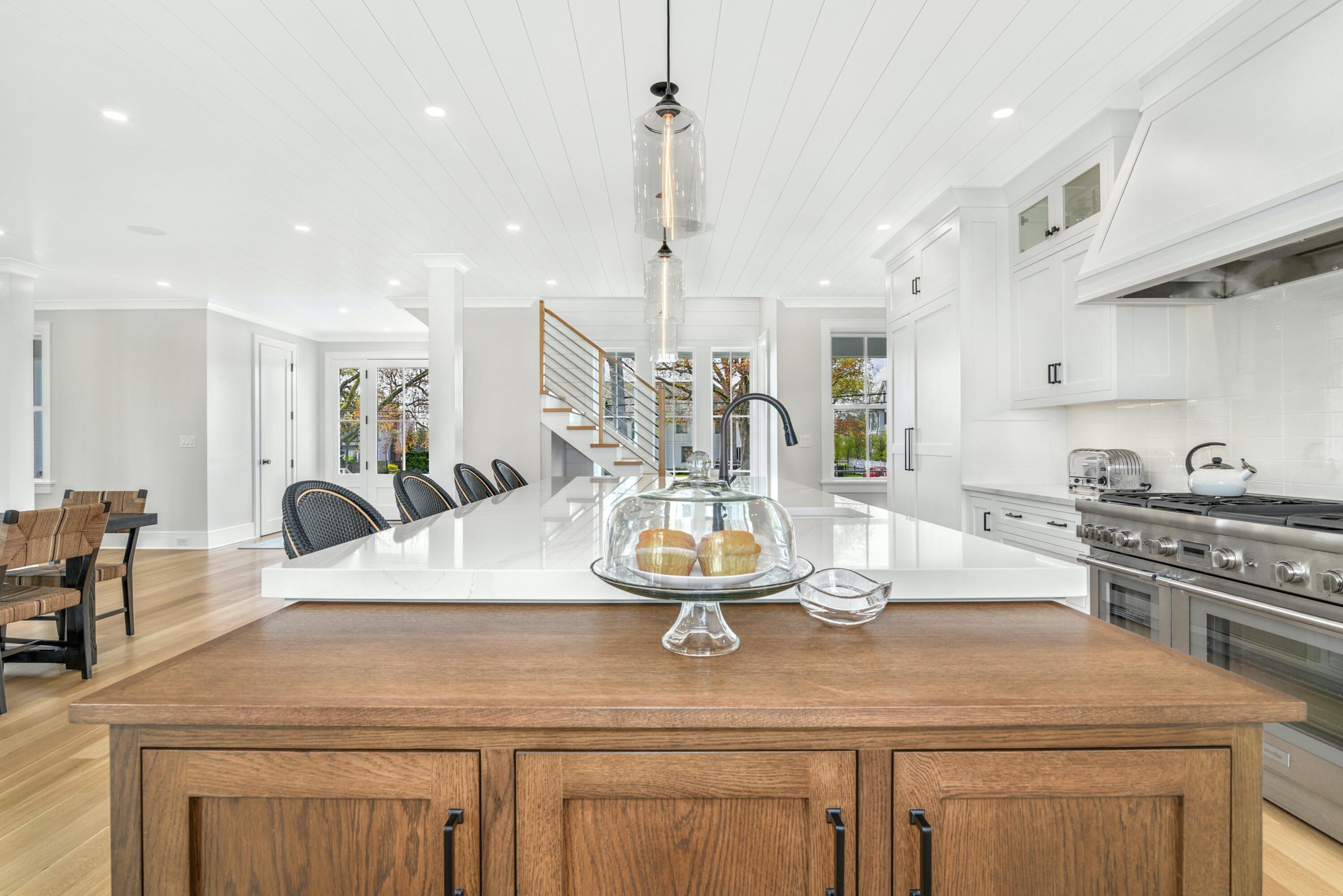 15 Waverly Road Darien, CT 06820 - Photo 11 of 36 a kitchen with kitchen island white cabinets and counter space