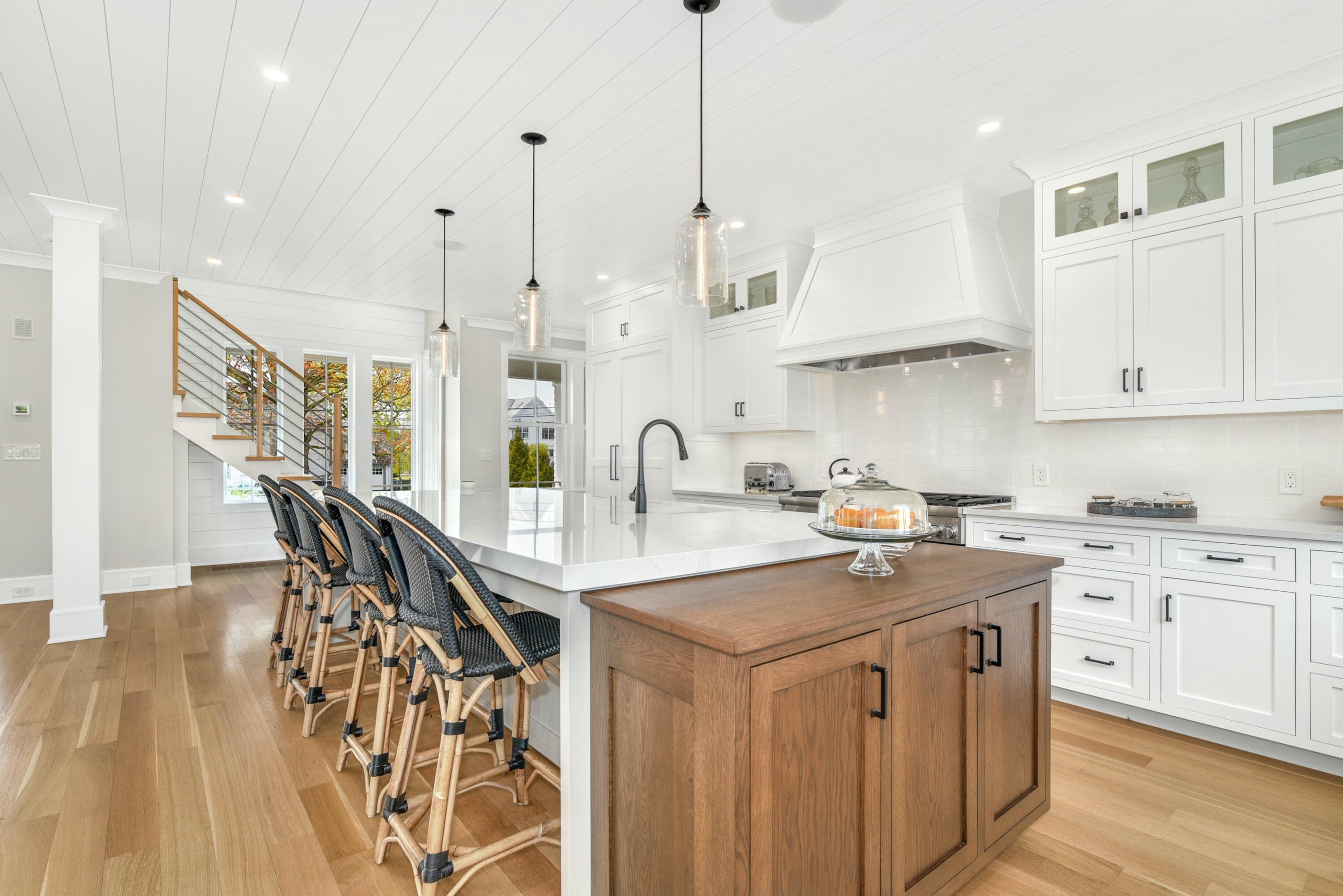 15 Waverly Road Darien, CT 06820 - Photo 12 of 36 a kitchen with stainless steel appliances granite countertop a sink a stove and a wooden floors
