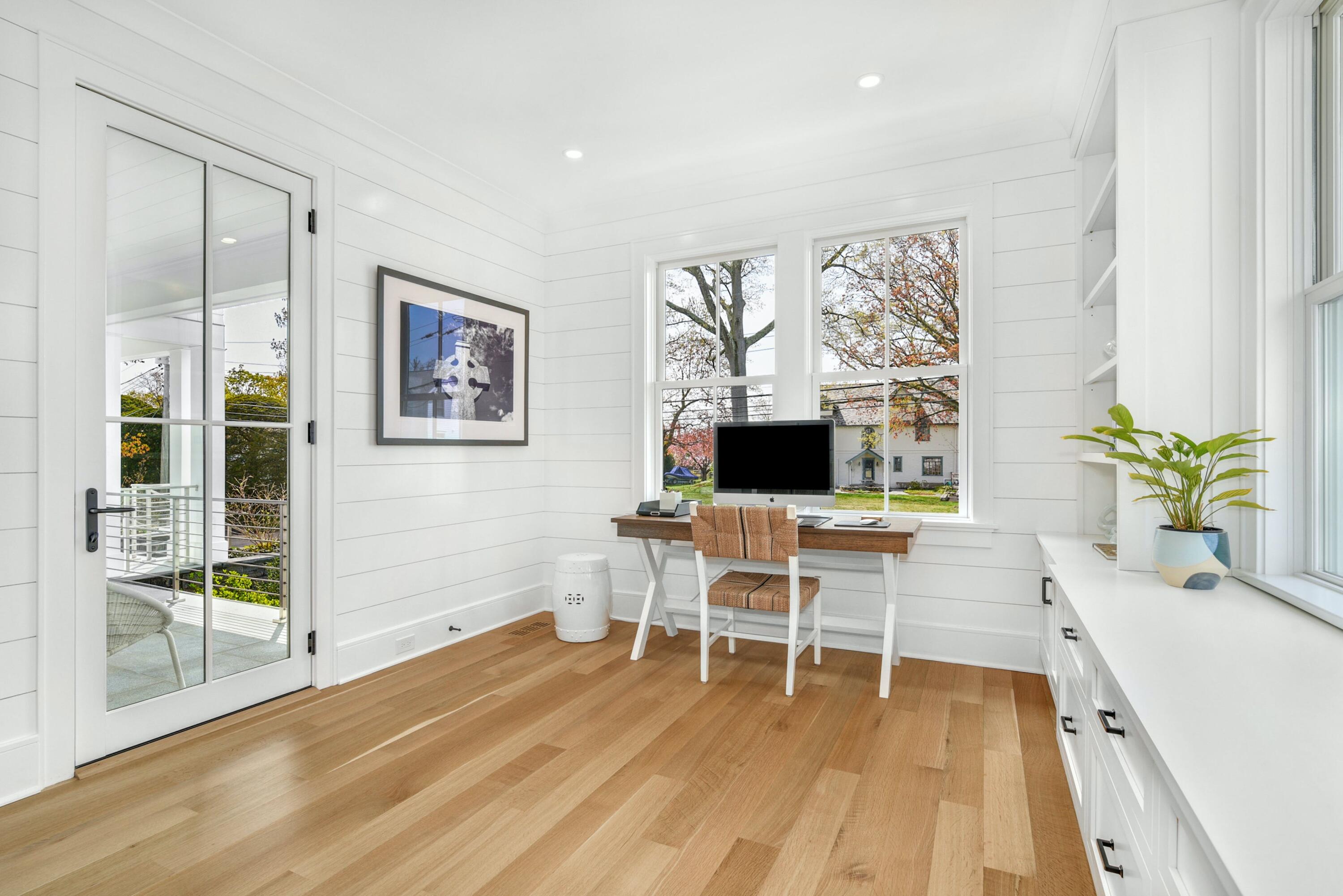15 Waverly Road Darien, CT 06820 - Photo 16 of 36 a living room with furniture a flat screen tv and a table