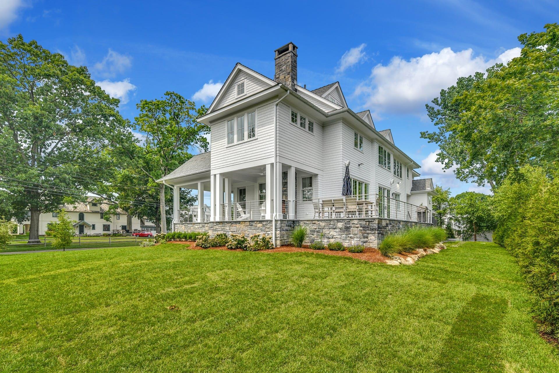 15 Waverly Road Darien, CT 06820 - Photo 2 of 36 a front view of house with yard and green space