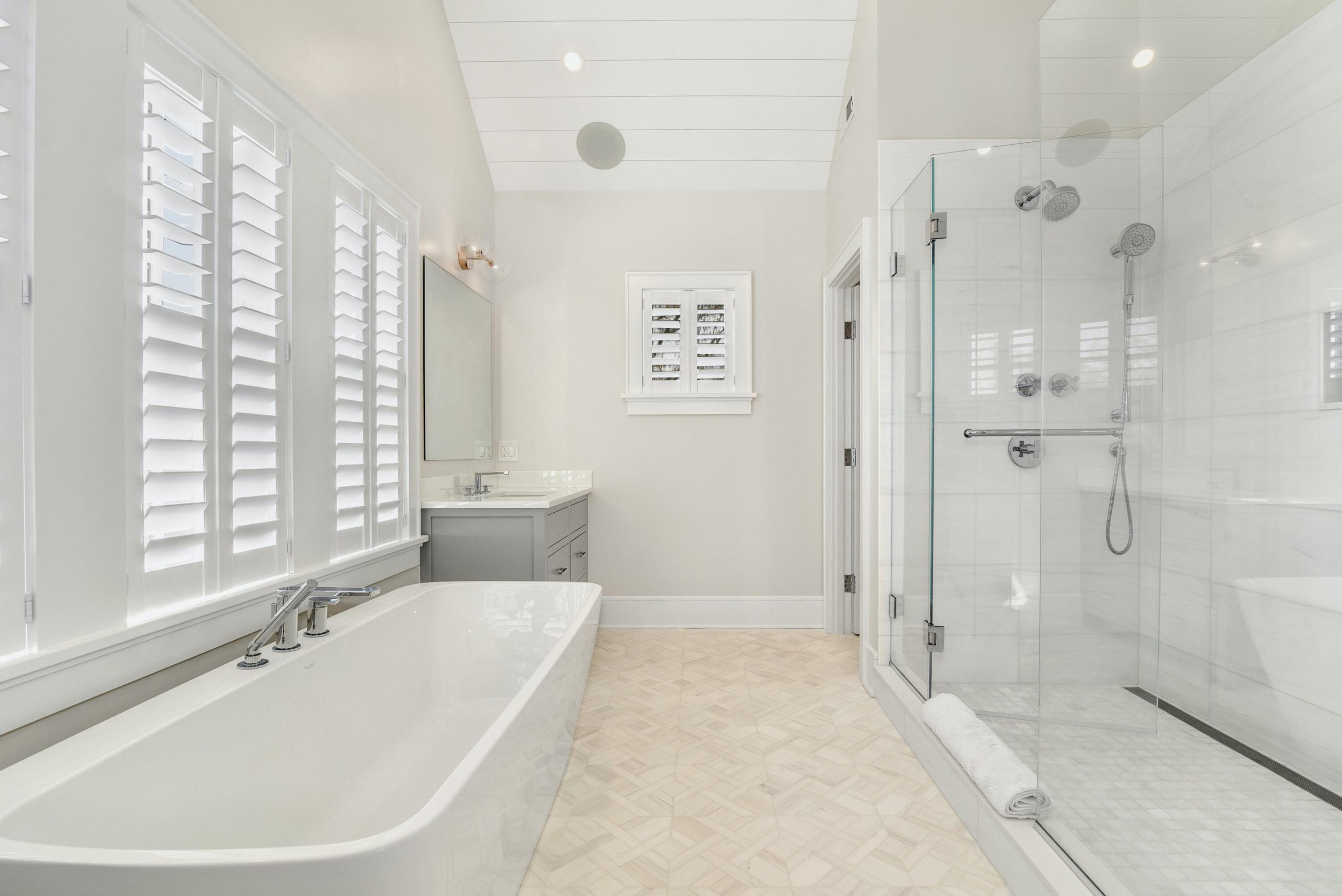 15 Waverly Road Darien, CT 06820 - Photo 23 of 36 a bathroom with a tub a window and a shower