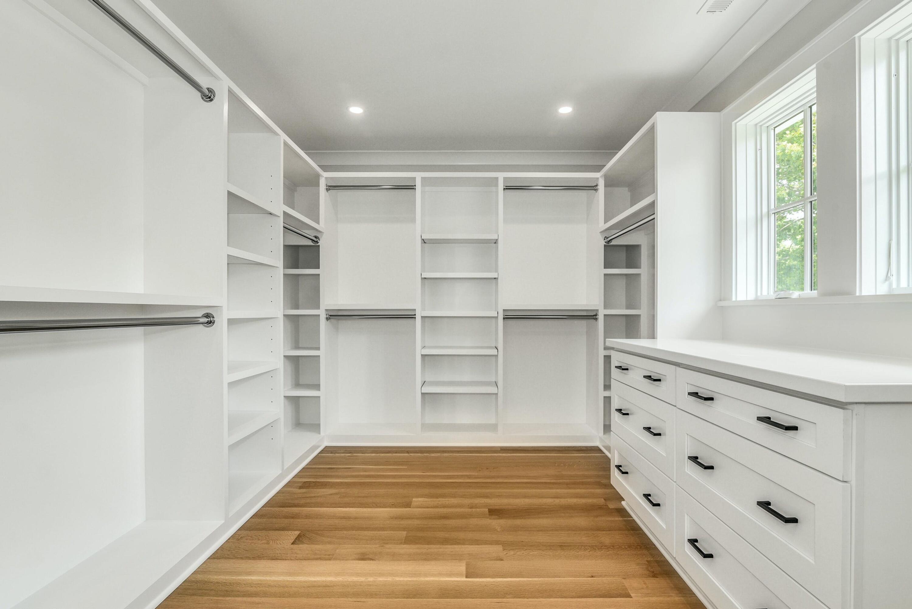 15 Waverly Road Darien, CT 06820 - Photo 24 of 36 a view of an empty room with a window and wooden floor