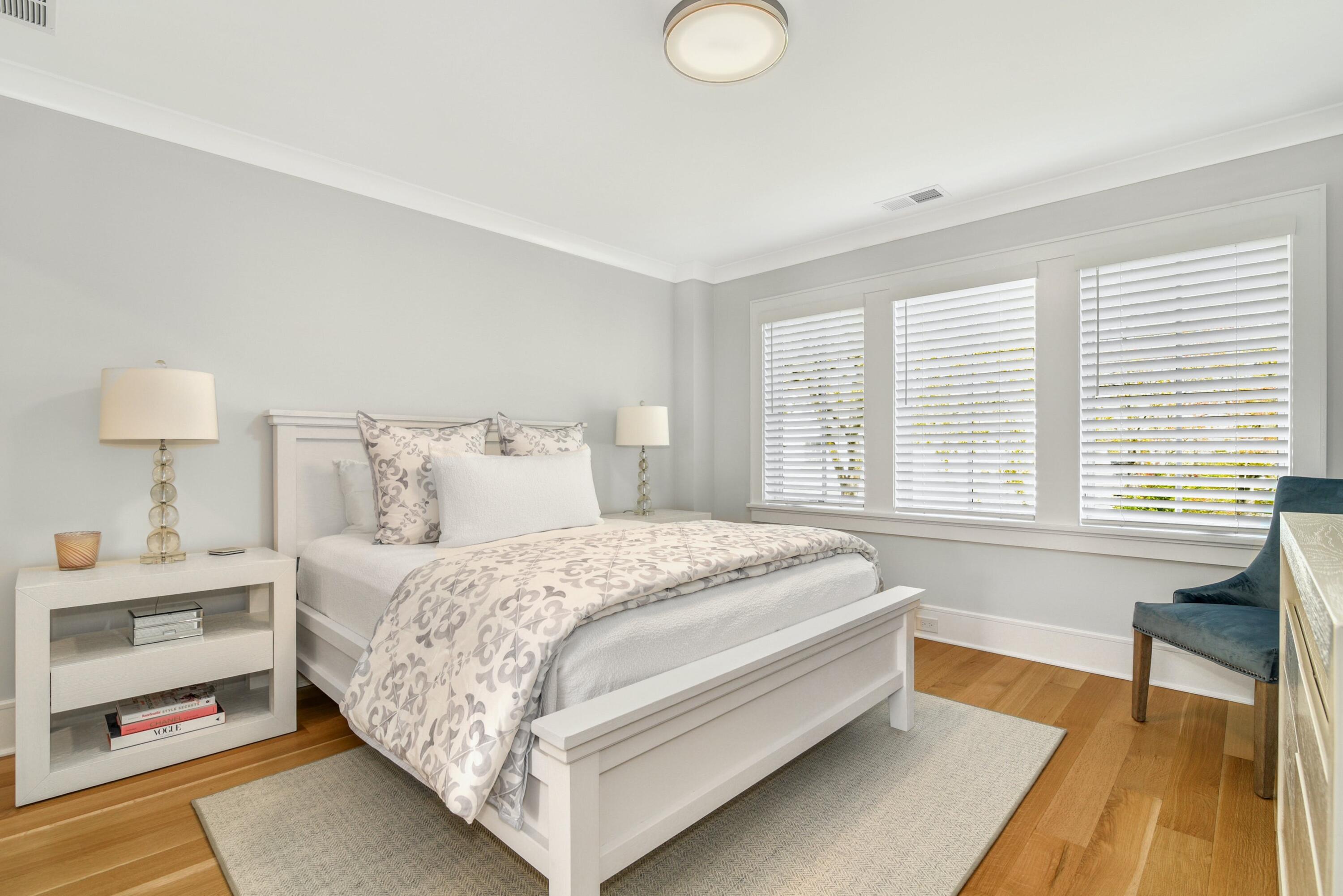 15 Waverly Road Darien, CT 06820 - Photo 25 of 36 a bedroom with a bed and a large window