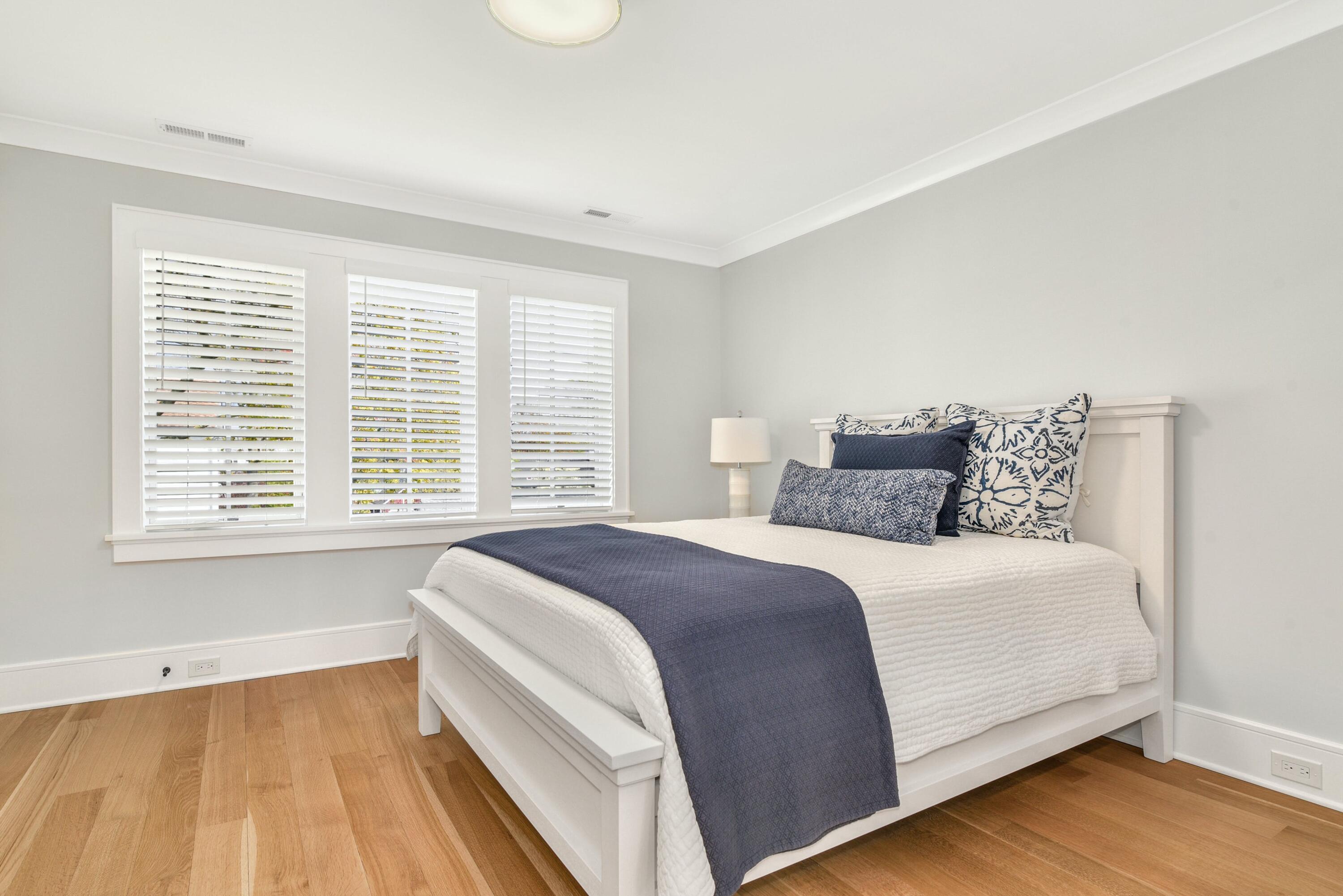 15 Waverly Road Darien, CT 06820 - Photo 26 of 36 a spacious bedroom with a bed and a window