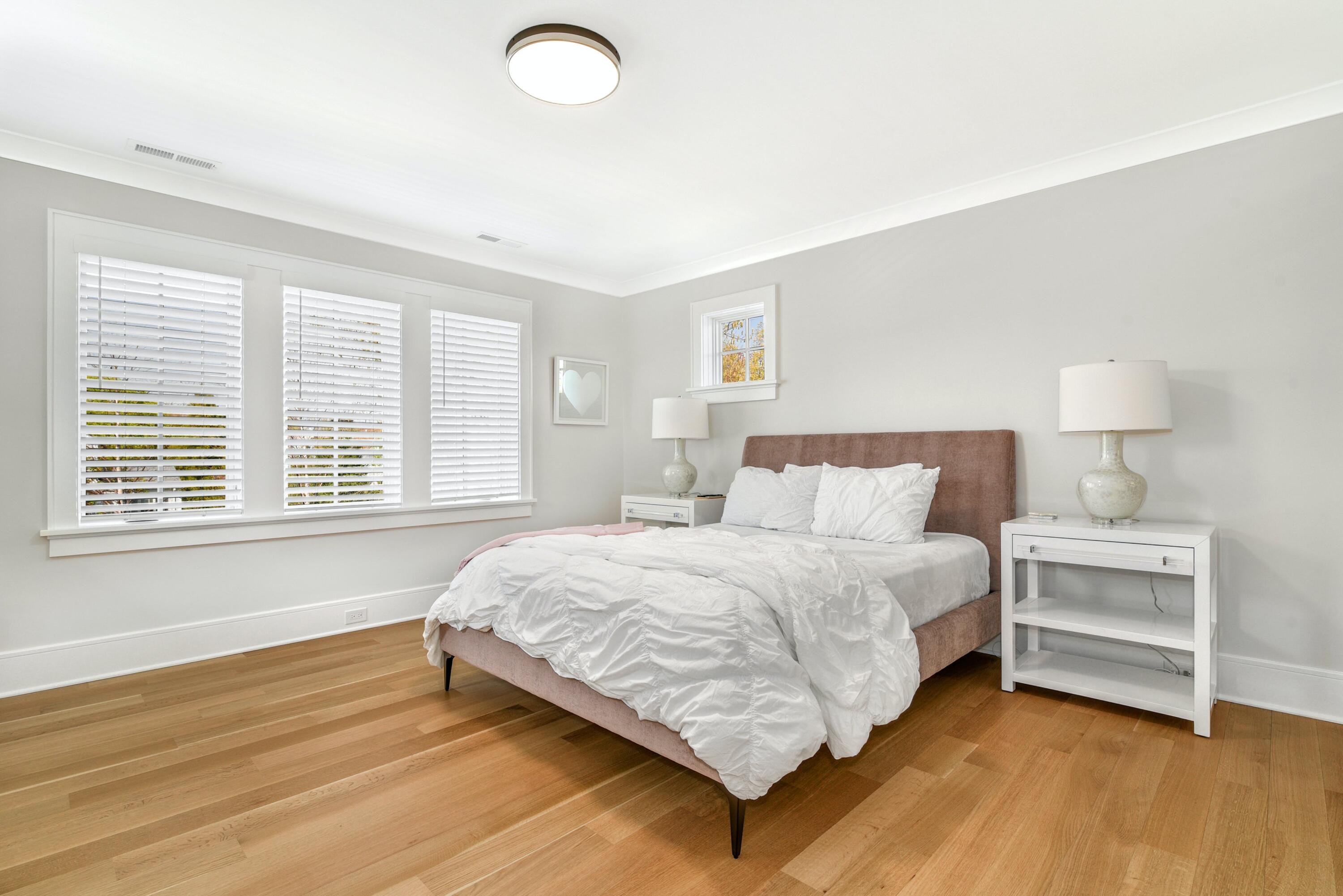 15 Waverly Road Darien, CT 06820 - Photo 28 of 36 a bedroom with a bed and a window