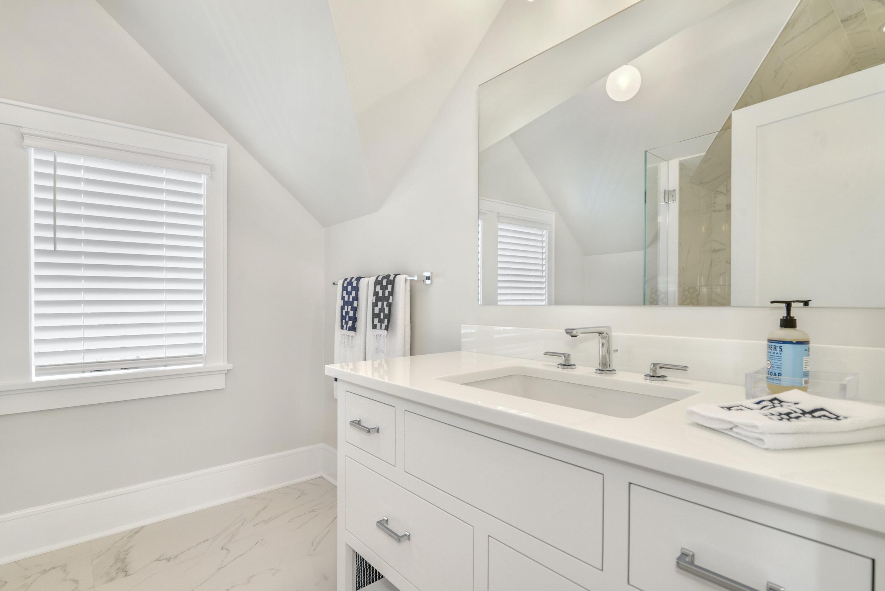 15 Waverly Road Darien, CT 06820 - Photo 32 of 36 a bathroom with a sink and a mirror