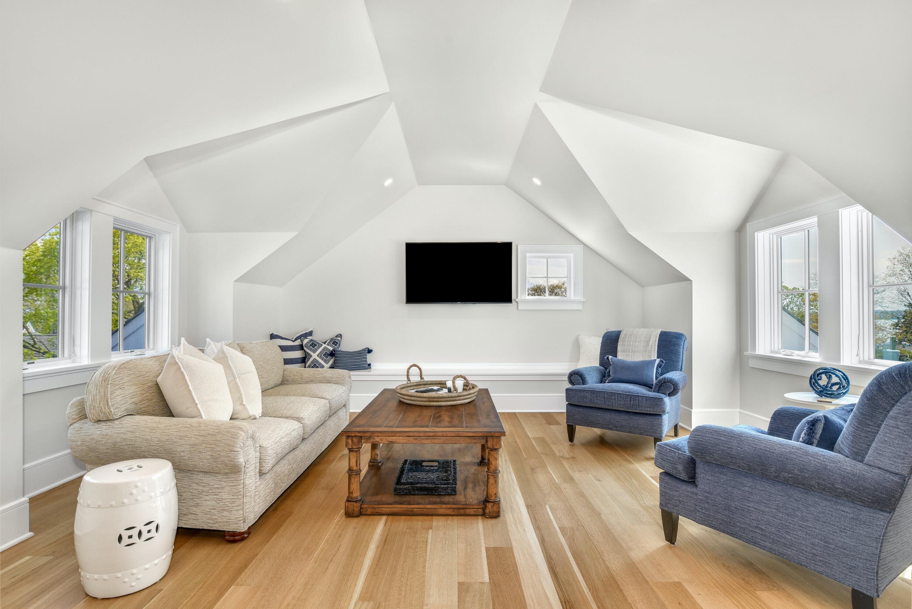 15 Waverly Road Darien, CT 06820 - Photo 33 of 36 a living room with furniture and a flat screen tv