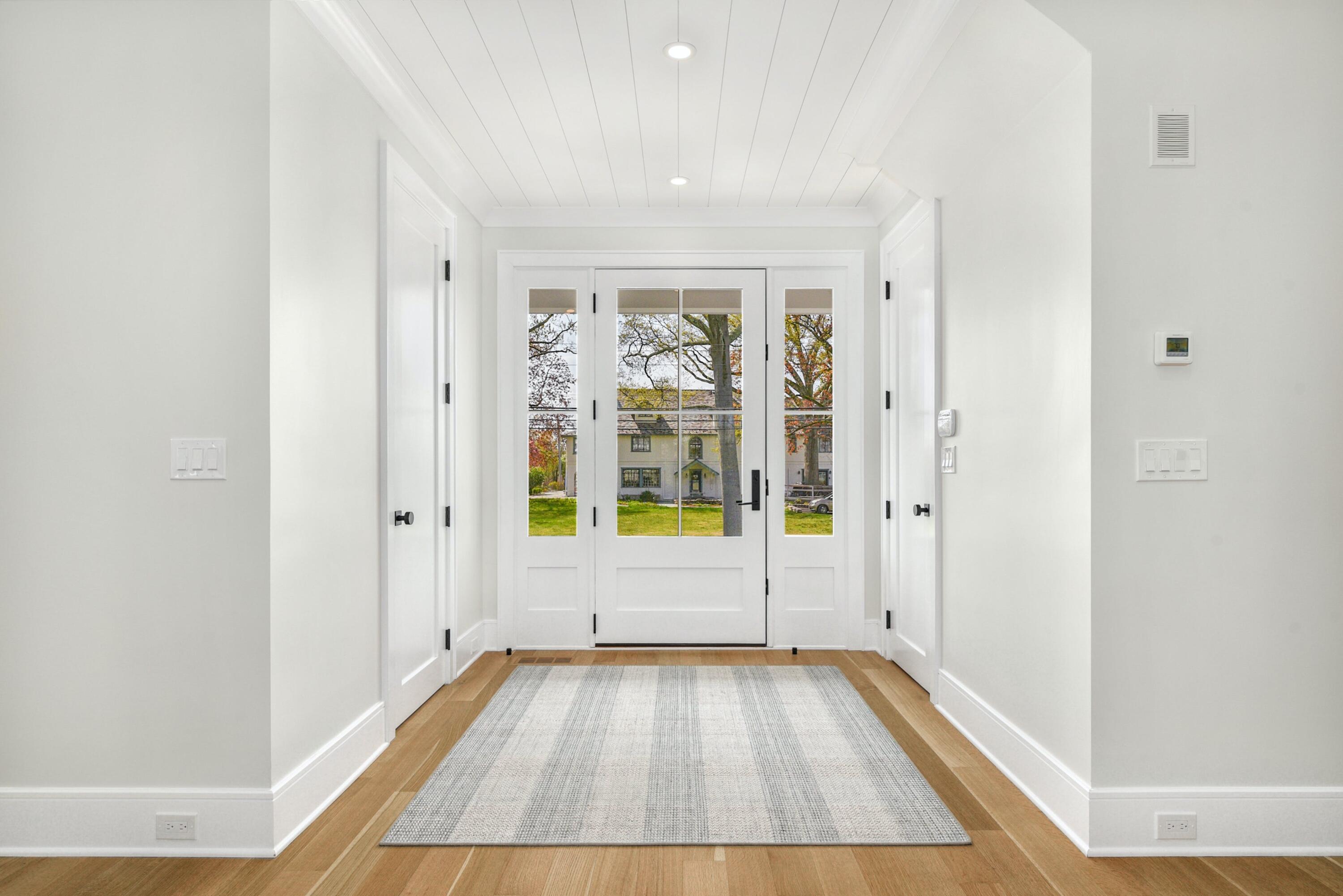 15 Waverly Road Darien, CT 06820 - Photo 7 of 36 a view of room with window and wooden floor