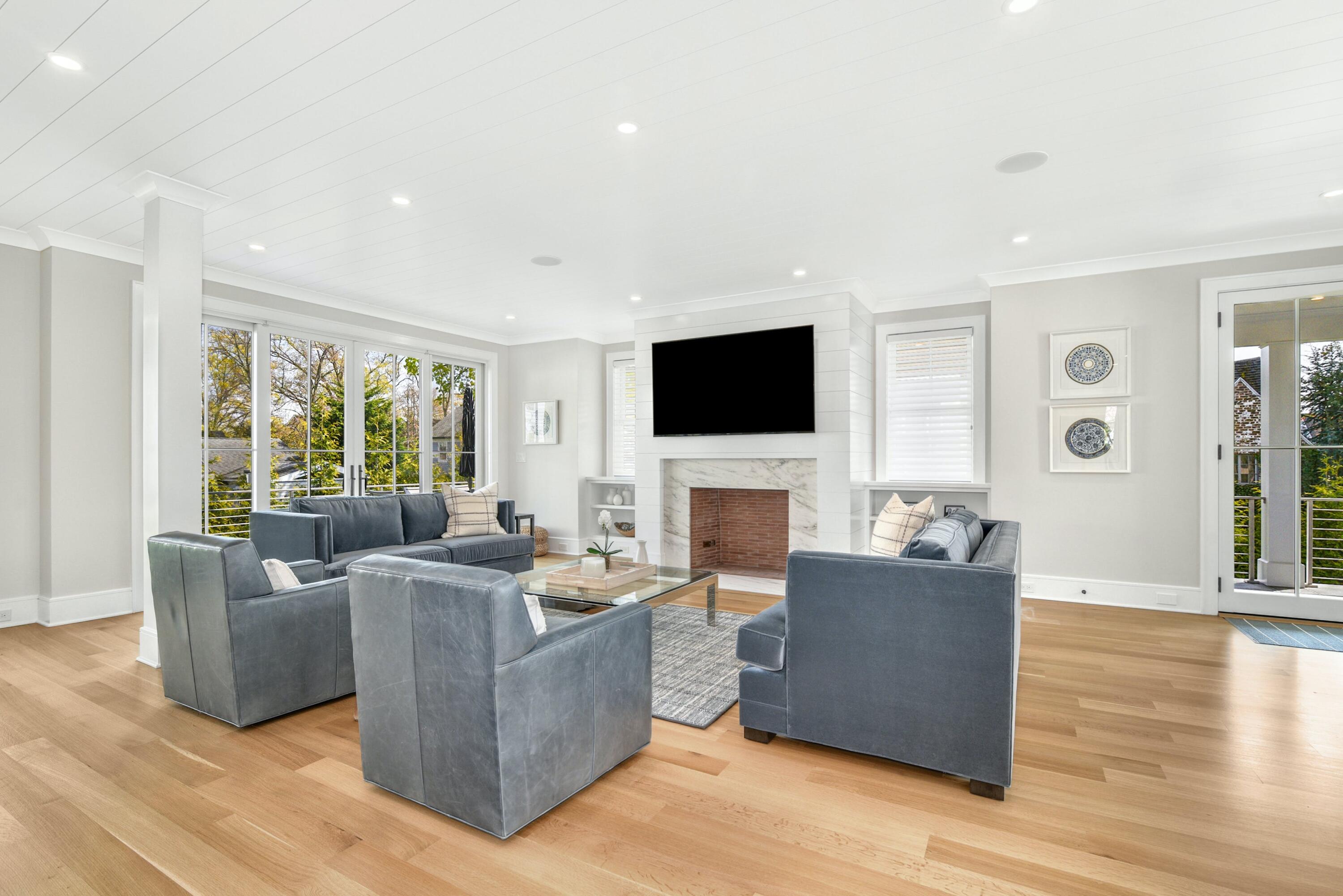 15 Waverly Road Darien, CT 06820 - Photo 8 of 36 a living room with furniture and a flat screen tv
