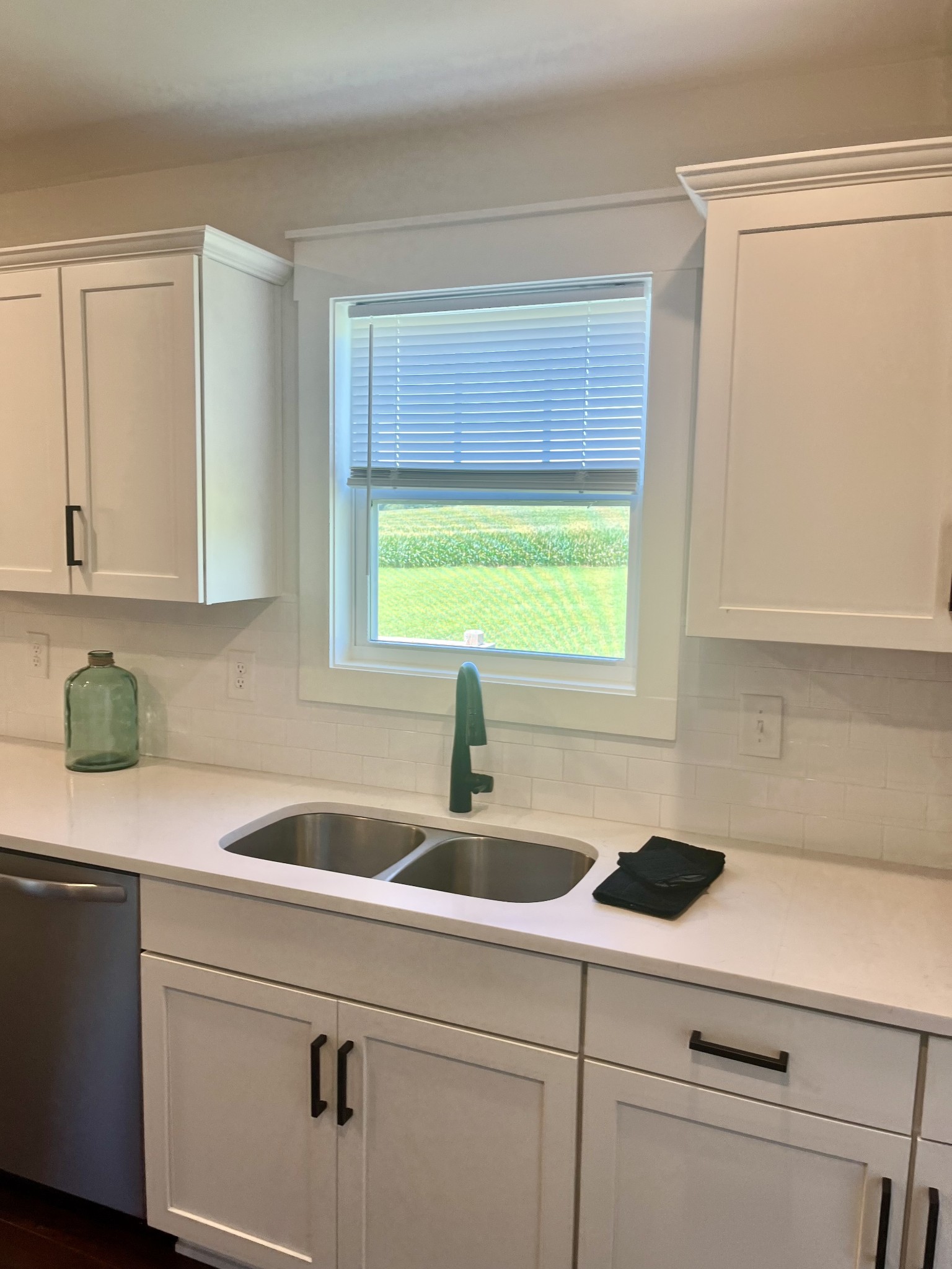 245 Tom Ferrell Road Portland, TN 37148 - Photo 11 of 27 a kitchen with a sink cabinets and a window