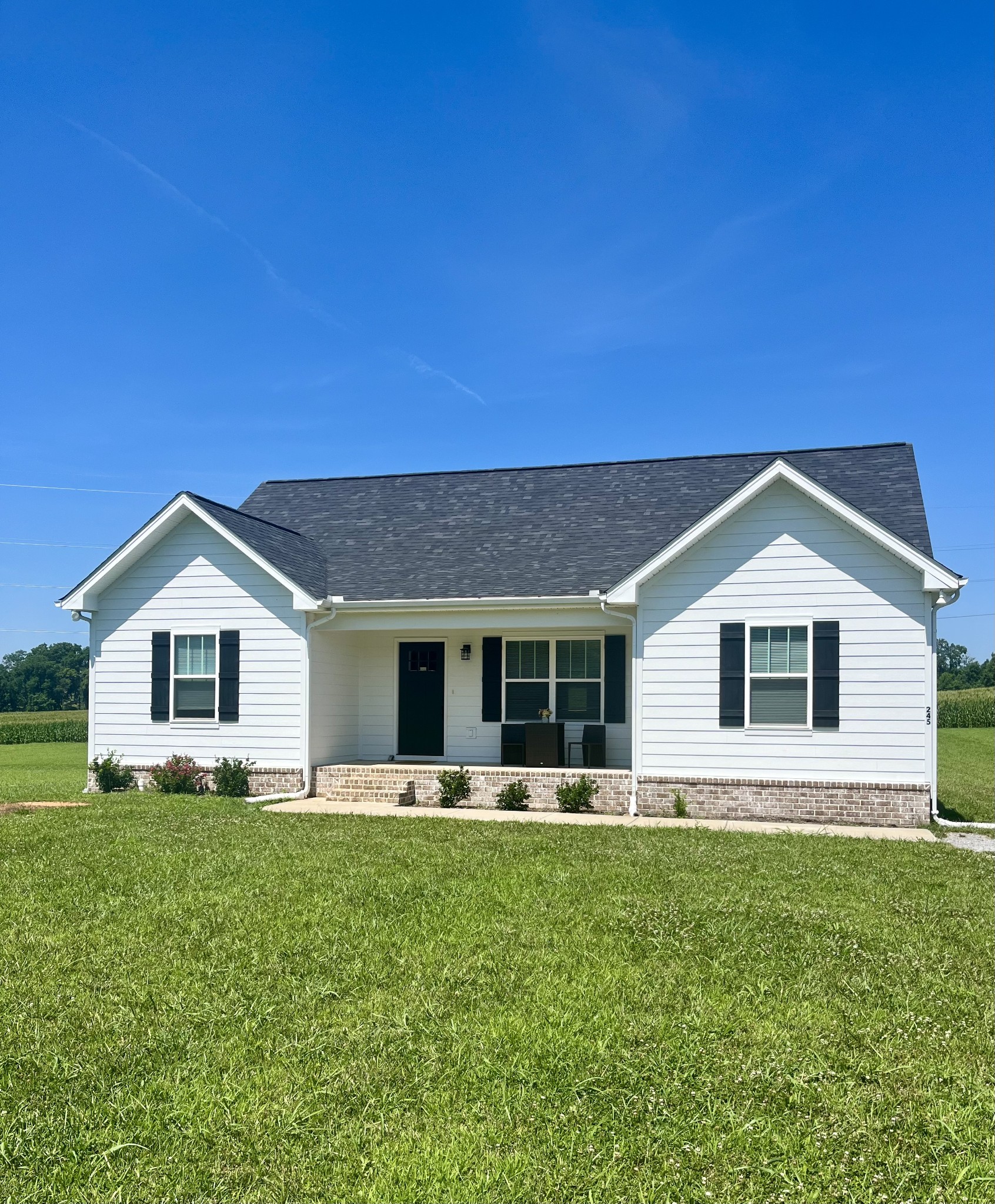 245 Tom Ferrell Road Portland, TN 37148 - Photo 2 of 27 a front view of house with yard and green space