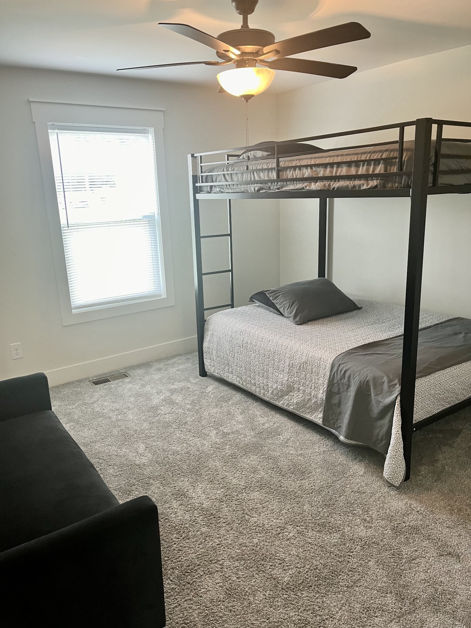 245 Tom Ferrell Road Portland, TN 37148 - Photo 22 of 27 a bedroom with a bed and window