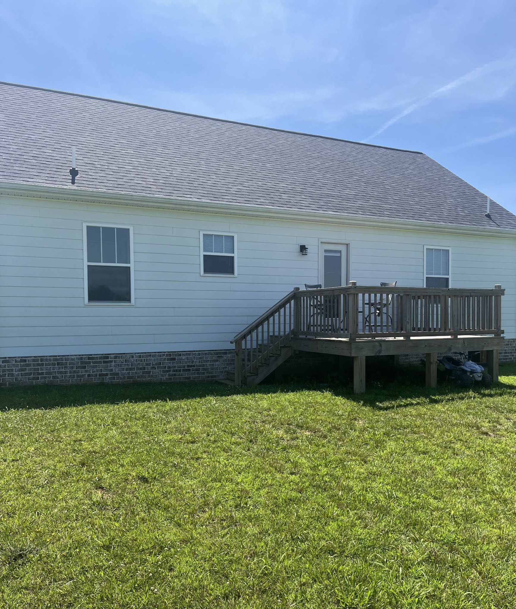 245 Tom Ferrell Road Portland, TN 37148 - Photo 23 of 27 a view of house with backyard and swimming pool