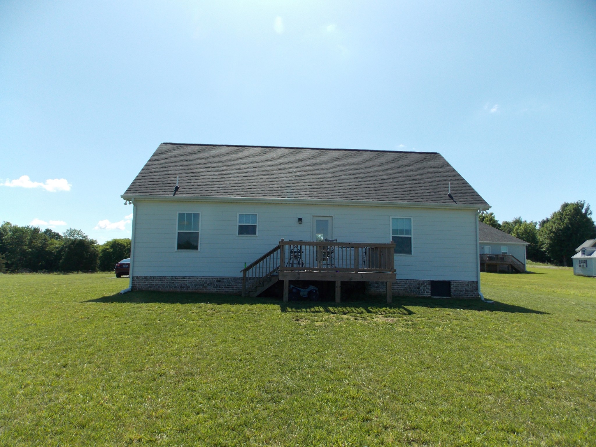 245 Tom Ferrell Road Portland, TN 37148 - Photo 24 of 27 a house view with a garden space