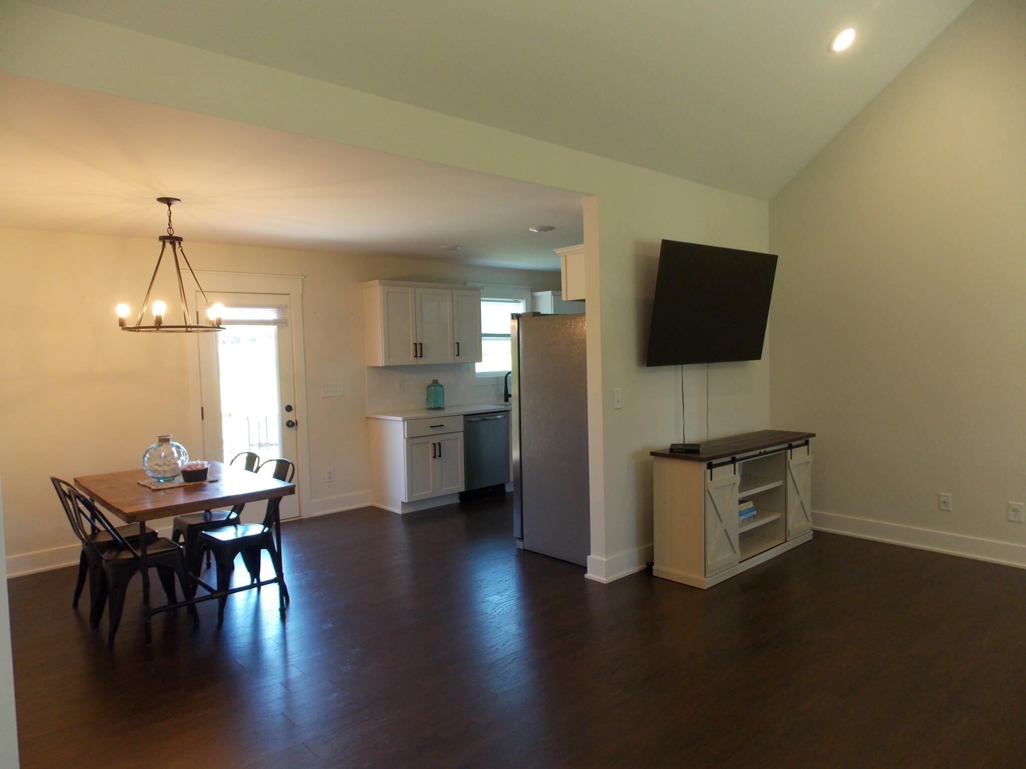 245 Tom Ferrell Road Portland, TN 37148 - Photo 4 of 27 a view of a dining room with furniture and wooden floor