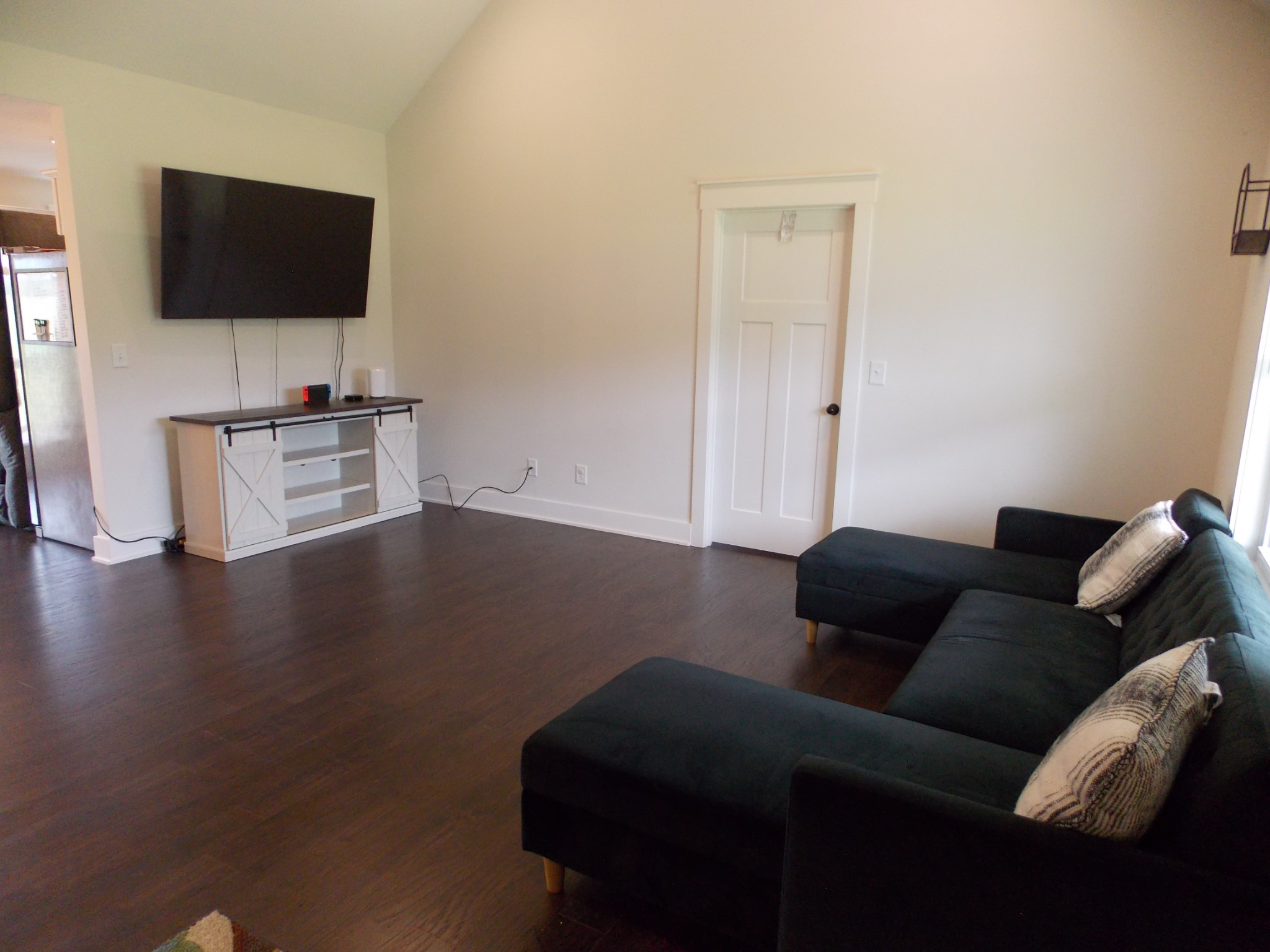 245 Tom Ferrell Road Portland, TN 37148 - Photo 7 of 27 a living room with furniture and a flat screen tv