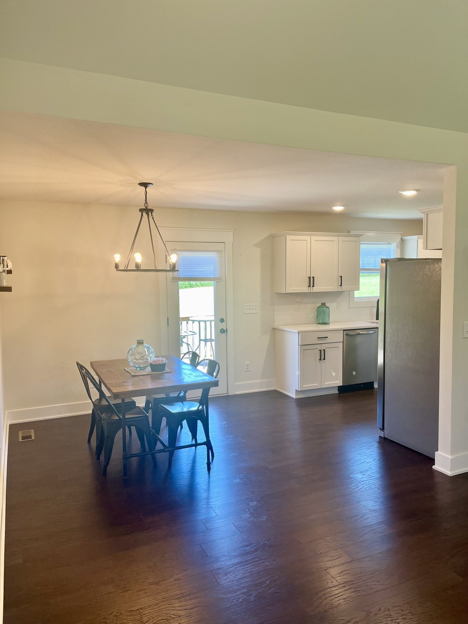 245 Tom Ferrell Road Portland, TN 37148 - Photo 8 of 27 a view of a dining room with furniture and wooden floor
