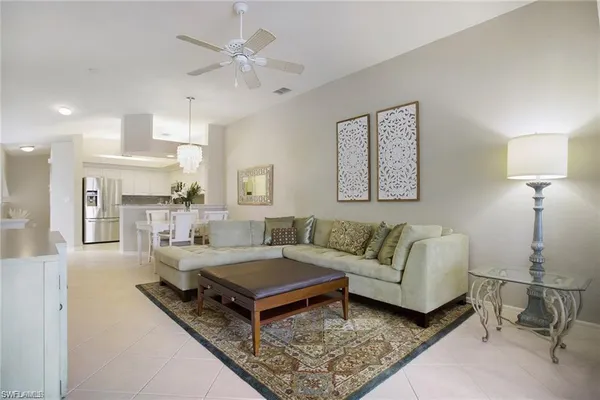 a living room with furniture and a table