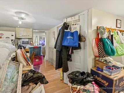 a bedroom with furniture and a gym equipment