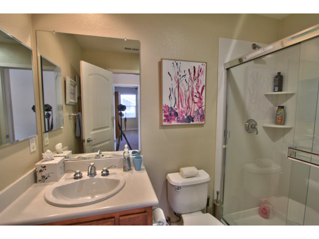 127 Fourth Street Spreckels, CA 93962 - Photo 16 of 20 a bathroom with a toilet sink and mirror