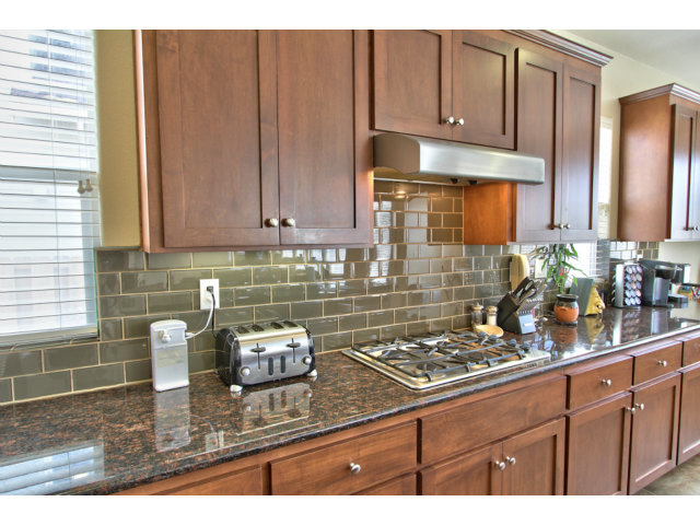 127 Fourth Street Spreckels, CA 93962 - Photo 3 of 20 a kitchen with stainless steel appliances granite countertop a sink stove and cabinets