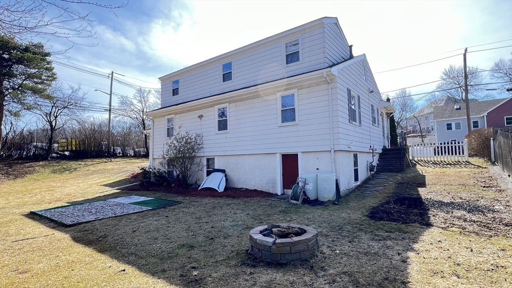 2 Carpenter Road Lynnfield, MA 01940 - Photo 3 of 20 a view of a back yard of the house