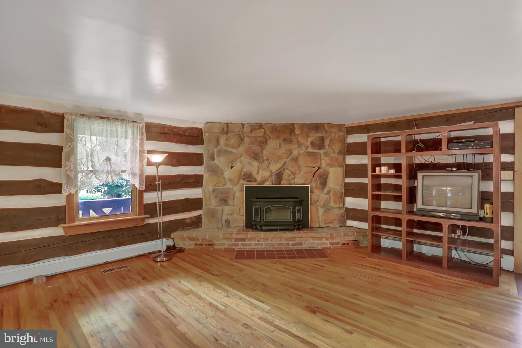 21 Graham Road Newville, PA 17241 - Photo 25 of 55 Living rm with wood stove insert