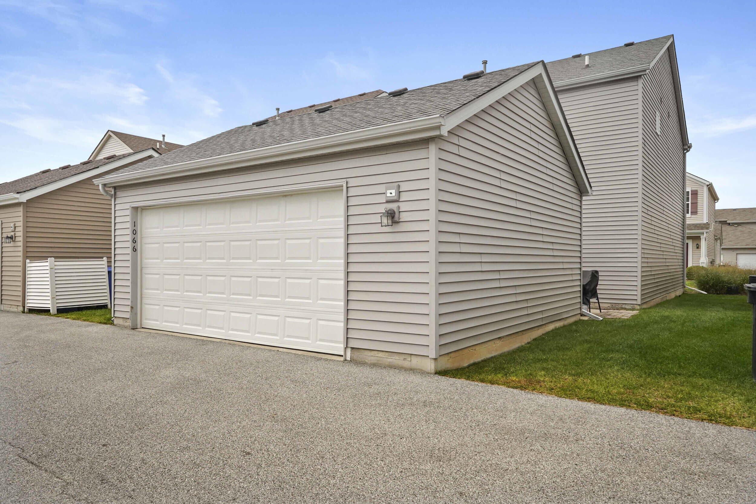 1066 East 115th Court Crown Point, IN 46307 - Photo 21 of 21 a view of a house with garage