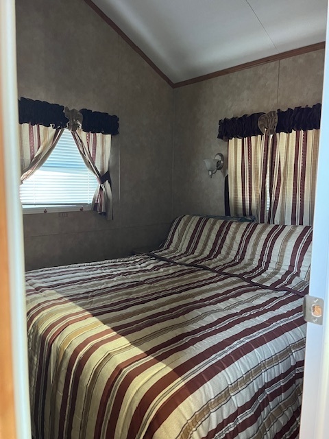 2795 East 28th Road Marseilles, IL 61341 - Photo 12 of 60 a view of a bed in a bedroom