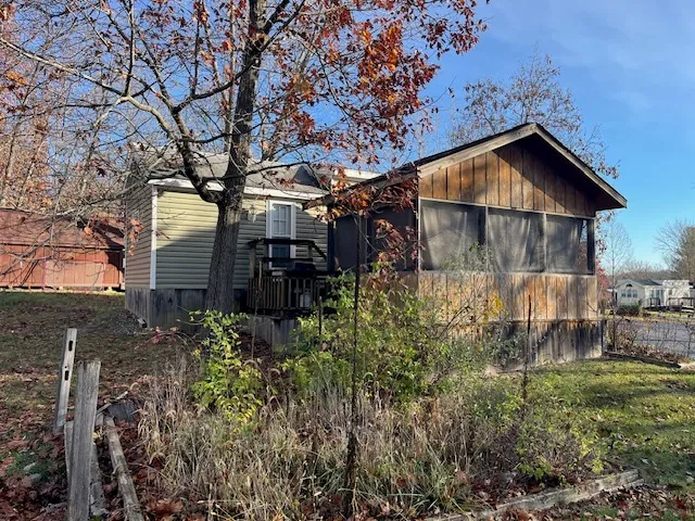 a backyard of a house with lots of green space