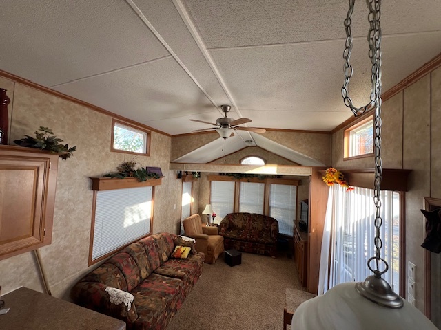 2795 East 28th Road Marseilles, IL 61341 - Photo 4 of 60 a living room with furniture a ceiling fan and a window